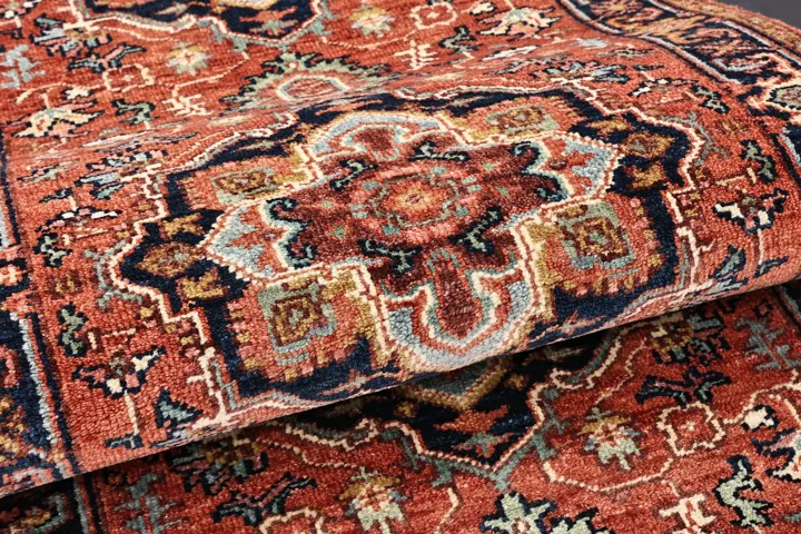 Folded red rug showing the pile