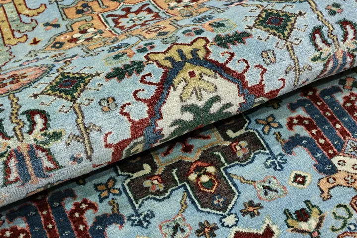 Folded teal and red rug